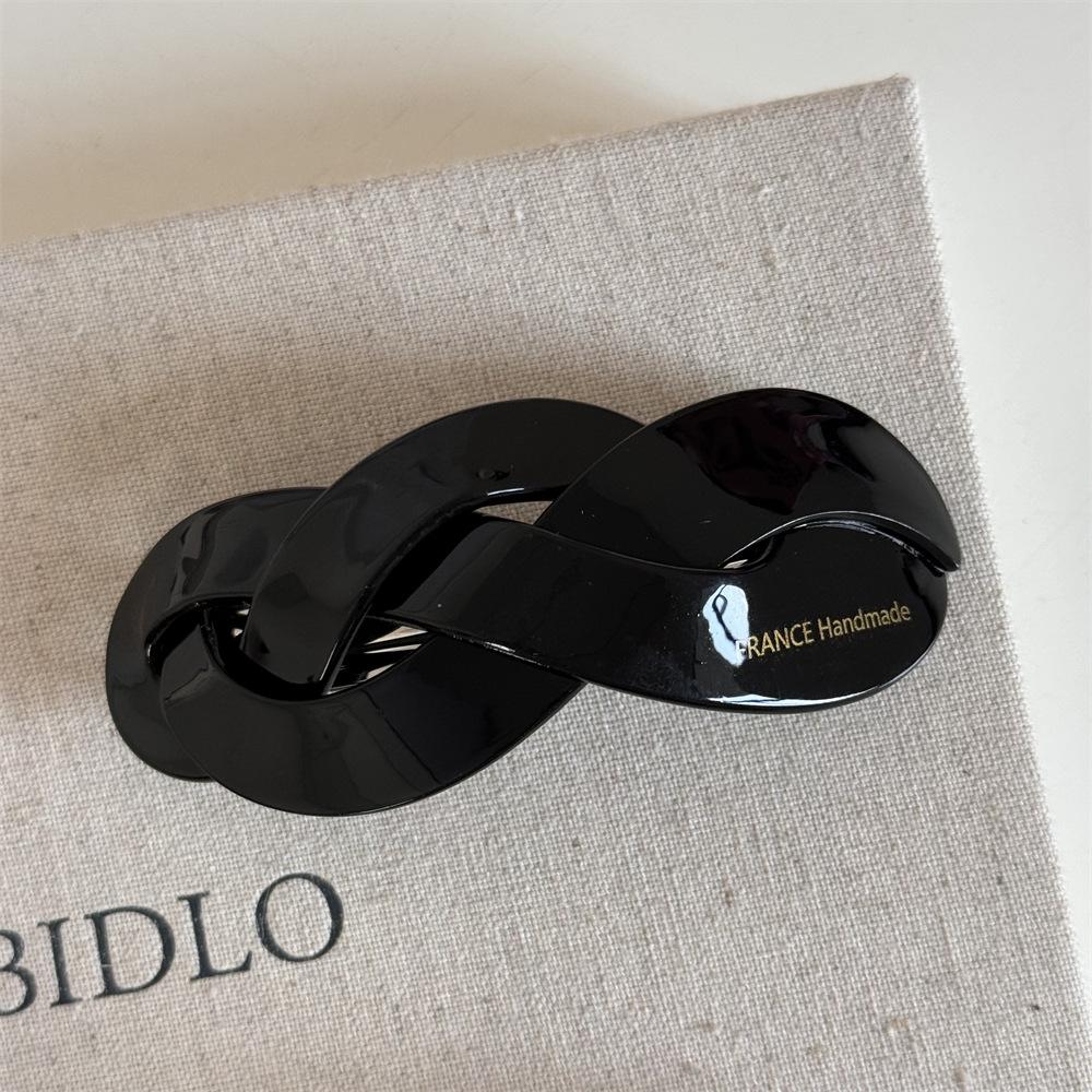 Korean version fashion French retro twist woven shape large ponytail spring clip disc hair top clip hair accessories new