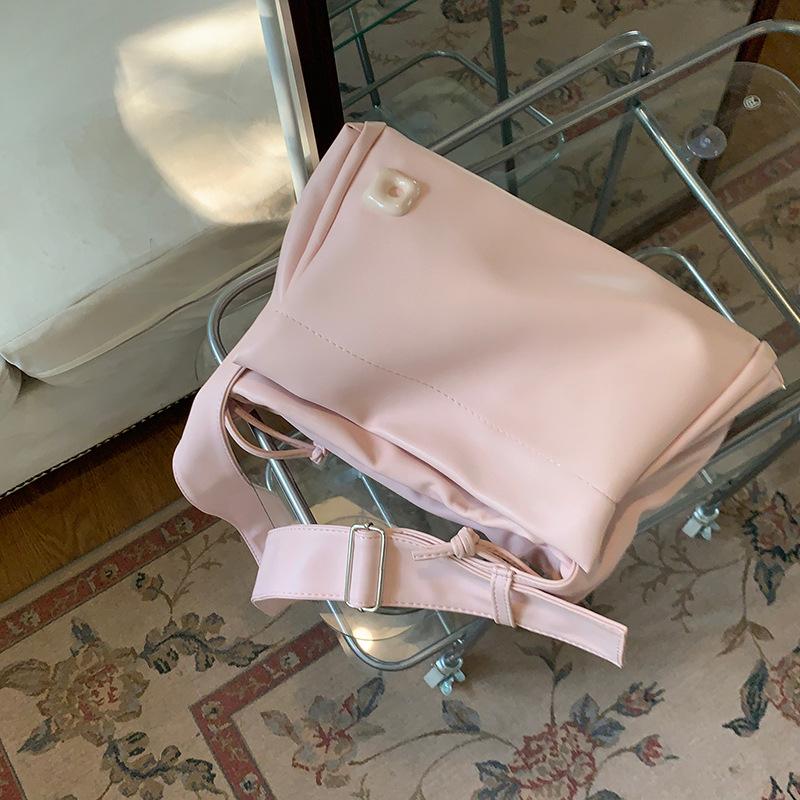 Вместительная розовая студенческая сумка для повседневной носки, сумка-игрушка для поездок на работу, новая текстурированная сумка через плечо для женщин