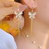 Elegant Butterfly Rhinestone Tassel Earrings - High-End, Trendy, and Flattering.