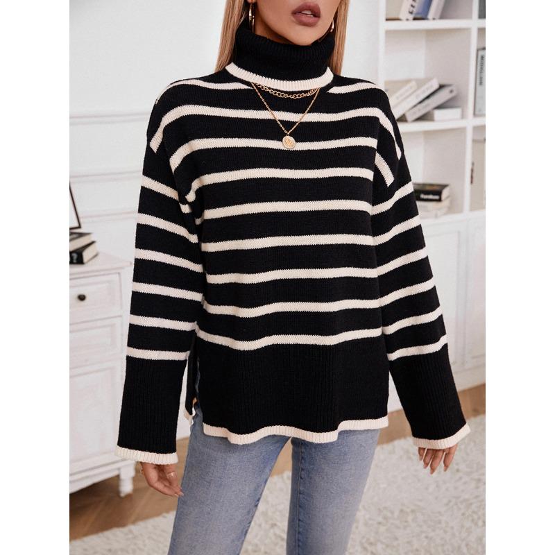Женский вязаный свитер-пуловер на осень и зиму с контрастными полосками и свободными разрезами. Водолазки