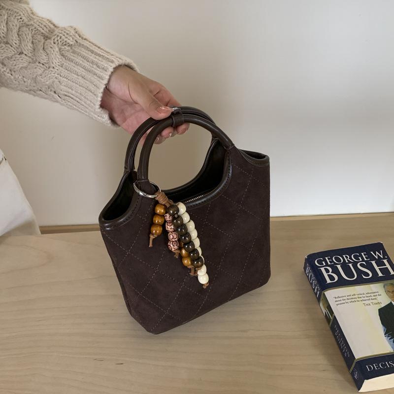 Ромбовидная женская сумка 2025 новая осенне-зимняя популярная высококачественная замшевая сумка на плечо кроссбоди сумка-ведро