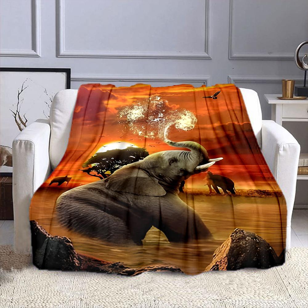 "Elephant at Sunset with Water Splash" Patterned flannel blanket perfect for the bedroom living room, sofa, or a little nap