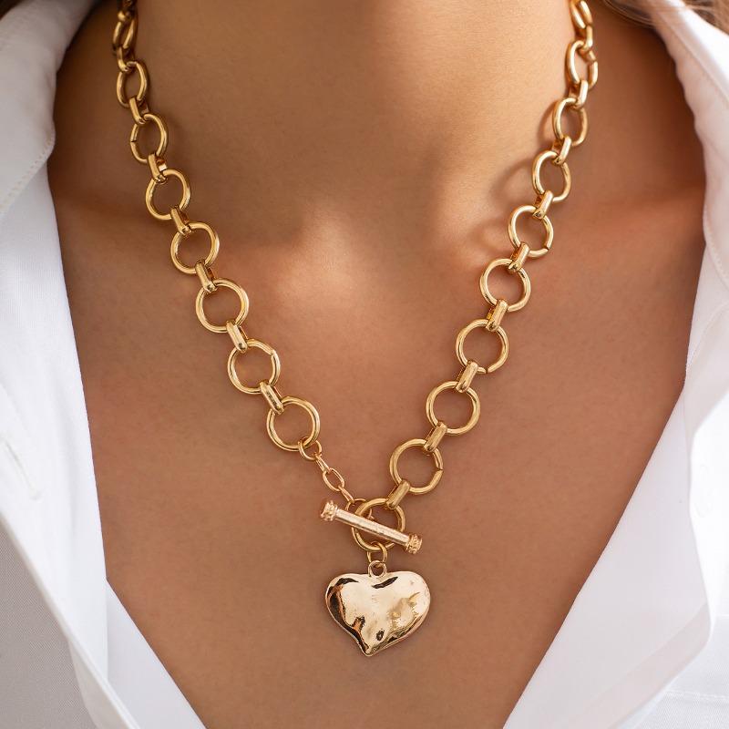 Meier Punk-inspired metal cross necklace with a trendy, edgy design. features a sweet and cool ot clasp chain