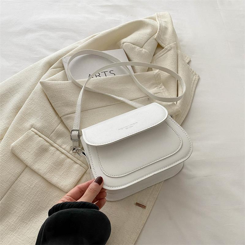 Нишевая дизайнерская сумка 2025 лето новая модная женская сумка ins стиль Гонконга ретро сумка-седло универсальная маленькая квадратная сумка