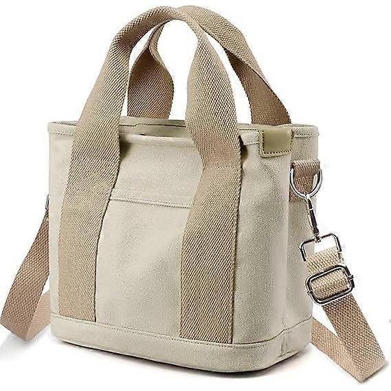 Women's canvas tote bag with multiple pockets, stylish shoulder handbag with compartments