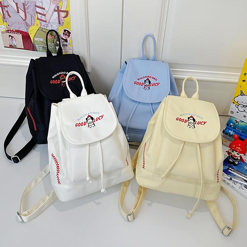 Japanese Student Casual Backpack with Embroidered Puppy Design, Drawstring Closure, and Matching Small Bag for Daily Use.