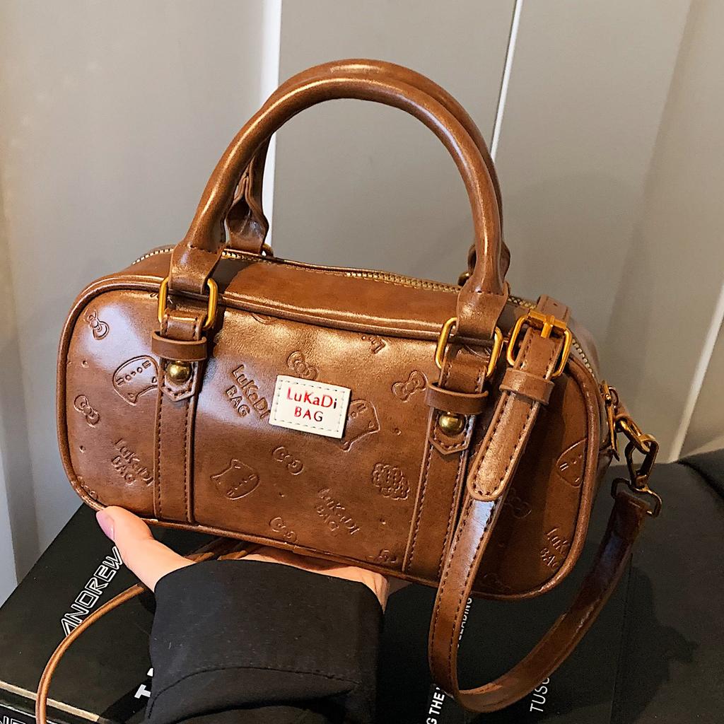 Fashion niche portable Boston bag women's 2025 new foreign retro commuter bag super fire shoulder messenger bag