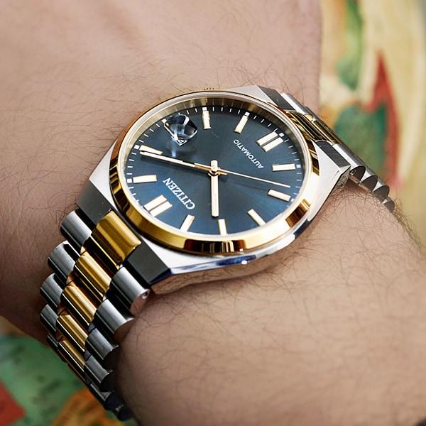 Citizen Унисекс NJ0154-80H ( Часы CITIZEN COLLECTION Механические) Круглые часы серебряные аналоговые