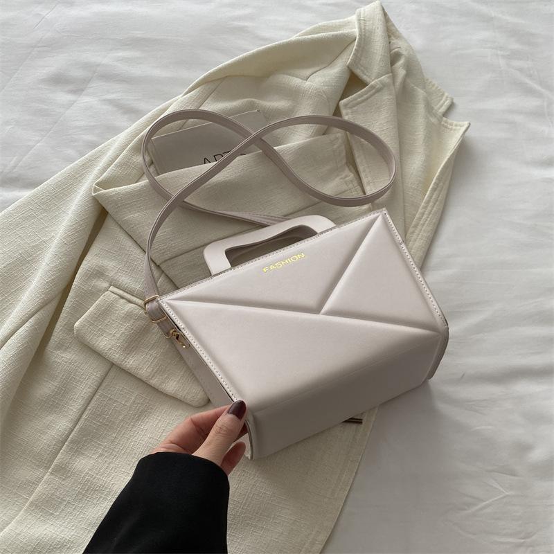 Высококачественная модная однотонная большая вместительная новая весенняя простая и модная ручная сумка через плечо небольшого размера