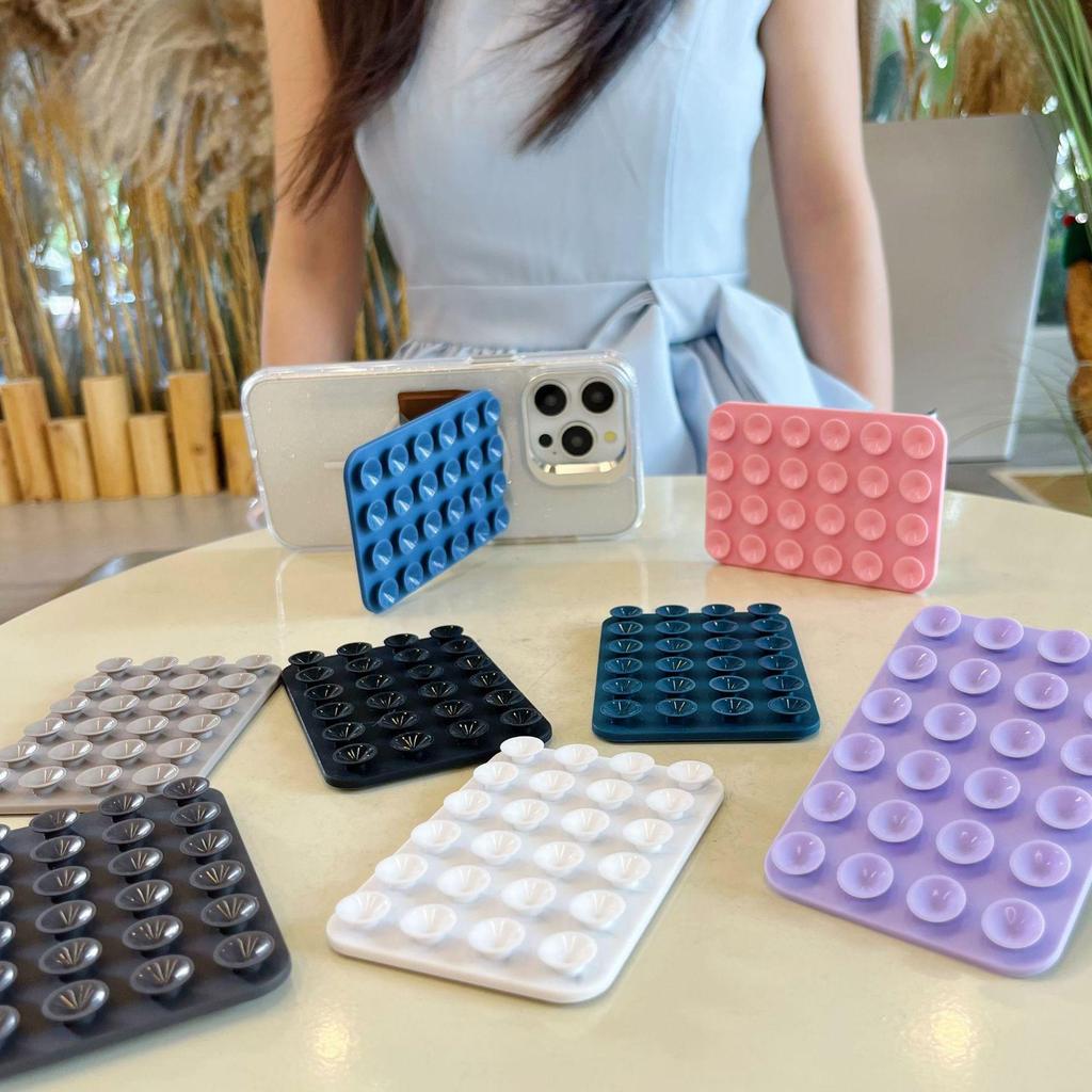 Многофункциональная силиконовая присоска - подставка для телефона и наклейка на заднюю панель