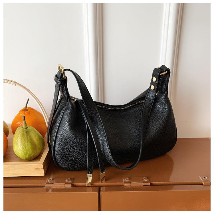 Bag women's new simple texture shoulder messenger bag lychee pattern niche fashion portable dumpling bag