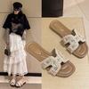 Сяосянфэн тапочки на мягкой подошве женские уличные 2025 осень новые на плоской подошве с перемычкой летние жемчужные пляжные фея модные иностранный стиль