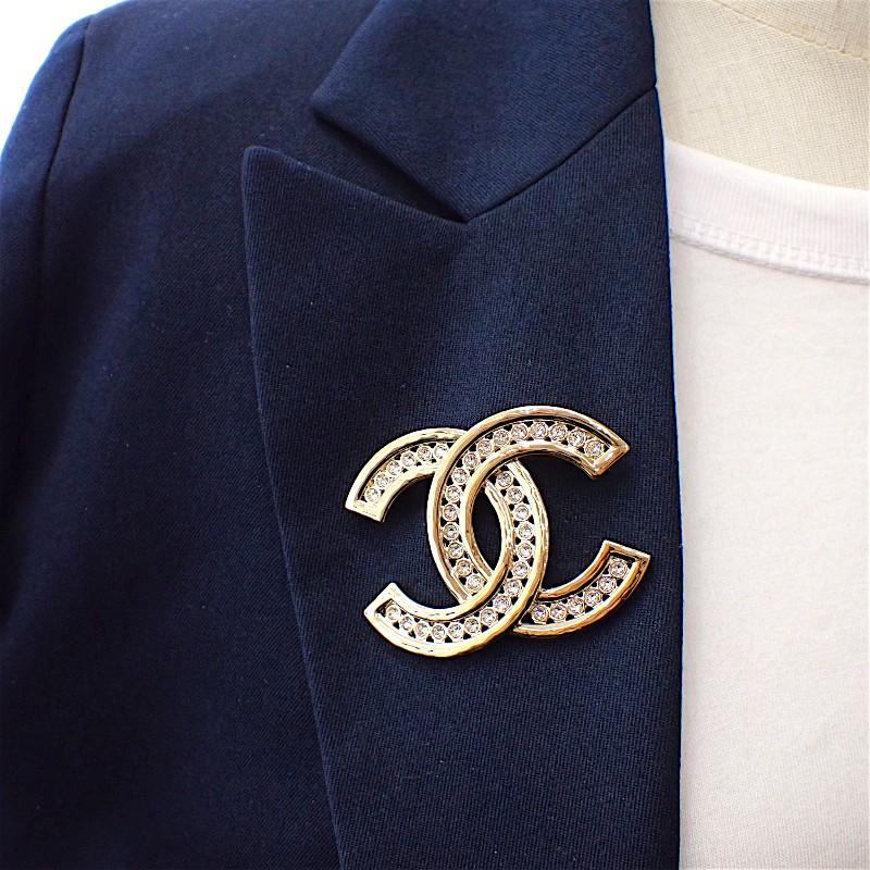 CHANEL  Brooch gold metal/Rhinestone Women
