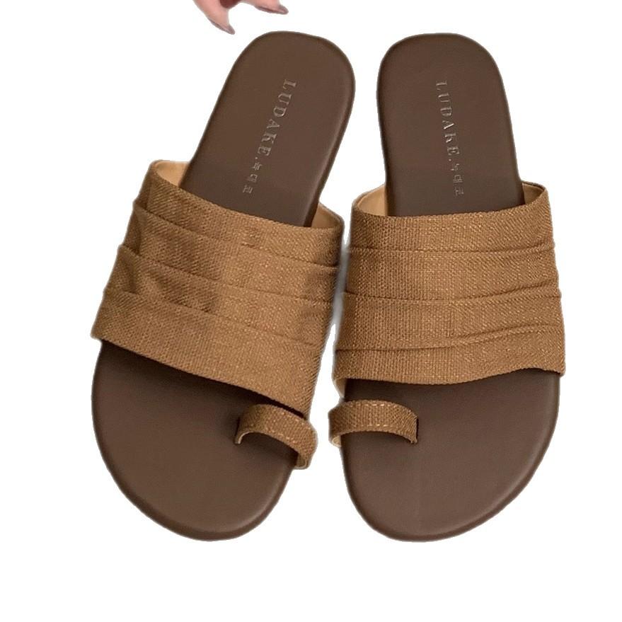 Design sense sleeve toe flat slippers women's outer wear summer new casual one-word drag temperament beach women's shoes