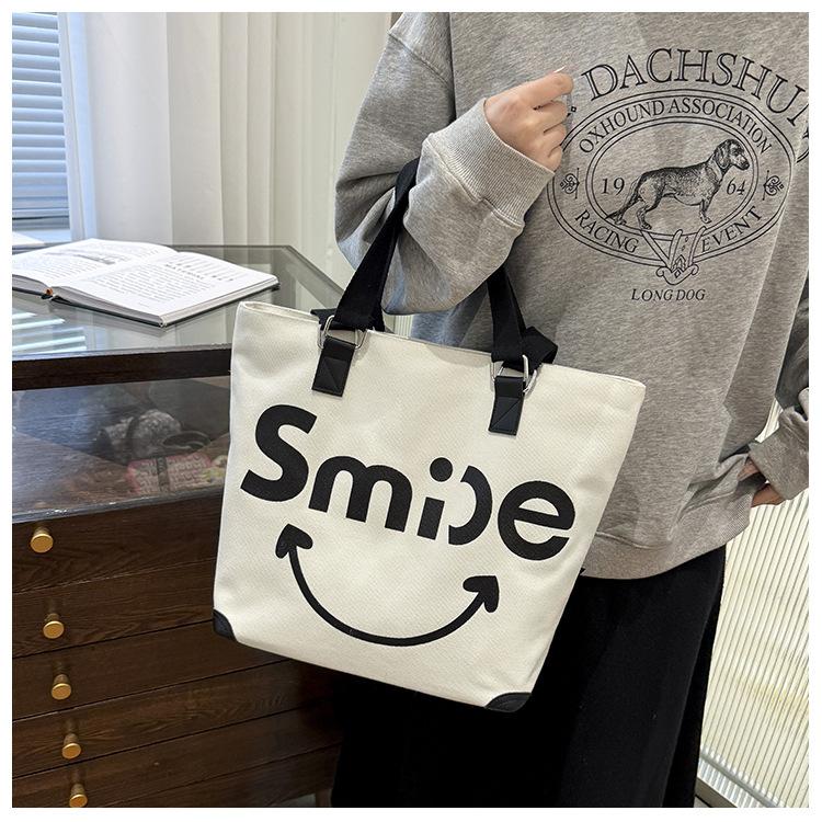 Большая вместительная холщовая большая сумка с буквами контрастного цвета, сумка на одно плечо с принтом улыбающегося лица и женская сумка через плечо