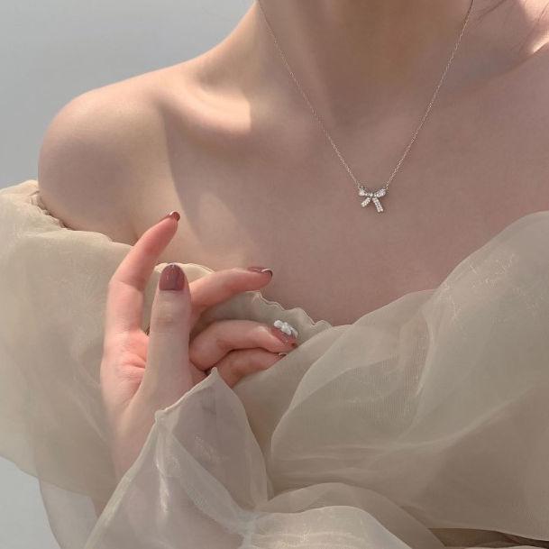 Женское легкое роскошное японское и корейское ожерелье-бантик - цепочка на ключицу 2022 года с эксклюзивным нишевым дизайном