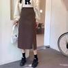 Женская черная юбка с высокой талией и разрезом средней длины - весна 2024 года, корейский дизайн А-силуэта