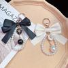 Женский брелок с жемчужной цепочкой и подвеской в виде большого банта для сумок