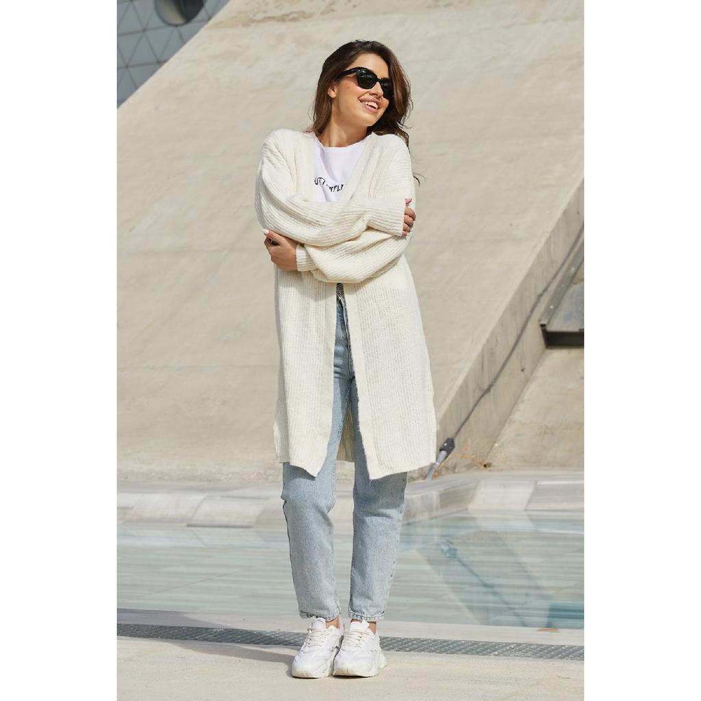 Женский трикотажный свитер с регулируемым узором и завязками по бокам