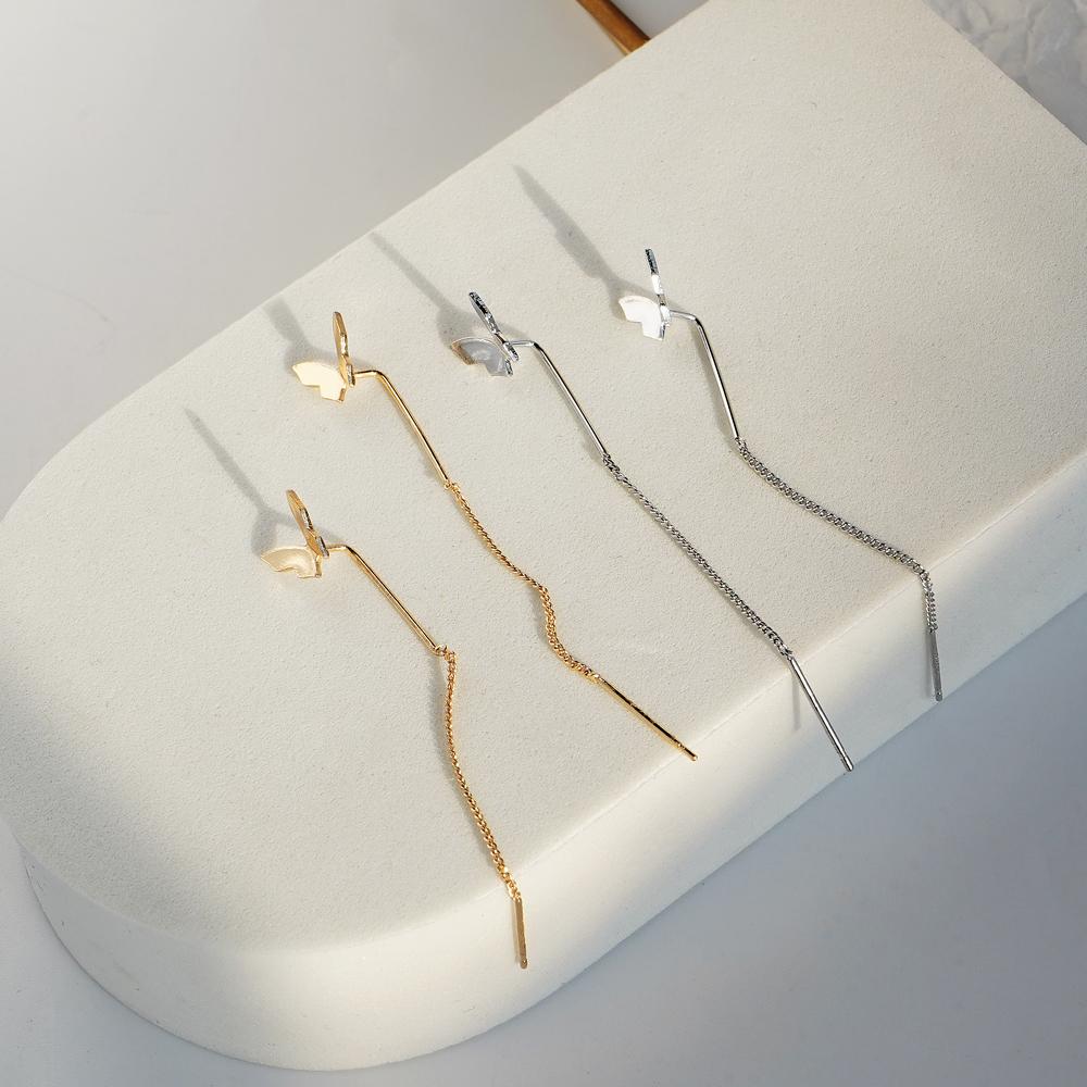 Женские серьги-бабочки универсальны, молоды и элегантны. Модные серьги с подвесками.