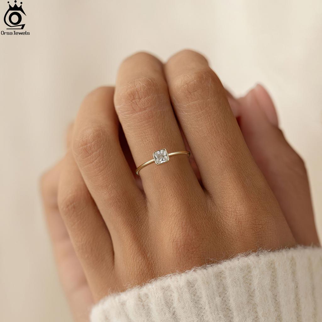 ORSA JEWELS Кольцо Вечность из 14-каратного золота с ААА Искрящимся Квадратным Цирконием Багетная Оправа Размер 5/6/7/8 Повседневное Ношение APR36