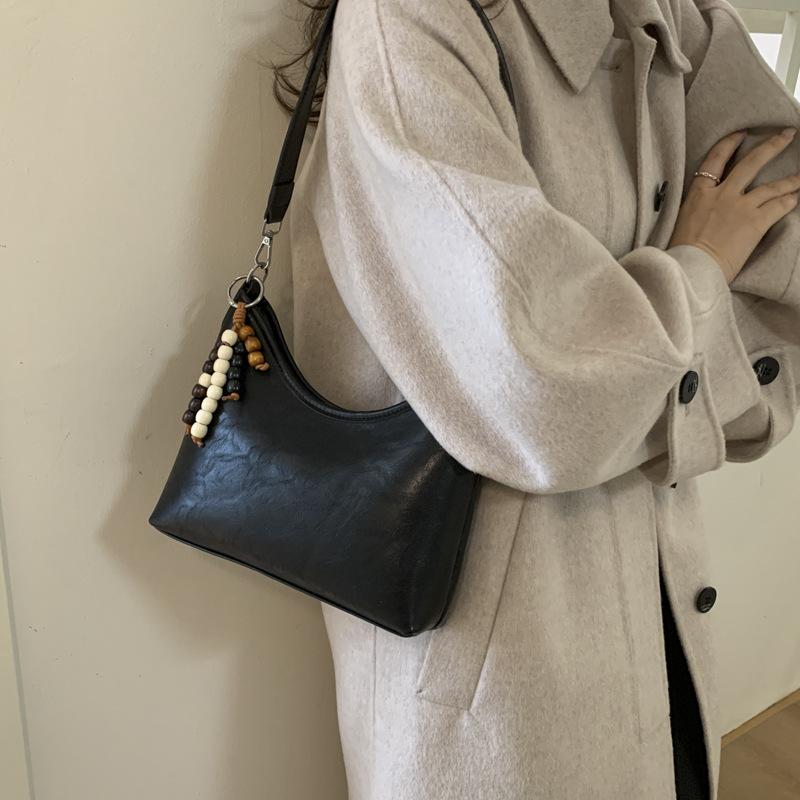 Маленькая сумка высокого класса женская 2025 новая осенне-зимняя модная универсальная сумка-мессенджер ретро на плечо подмышку сумка-ведро