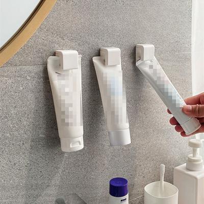 Подставка для зубной пасты Настенный держатель для зубной пасты без перфоратора, артефакт для выдавливания зубной пасты, зажим для очищающего средства для лица, настенное хранение в ванной и туалете