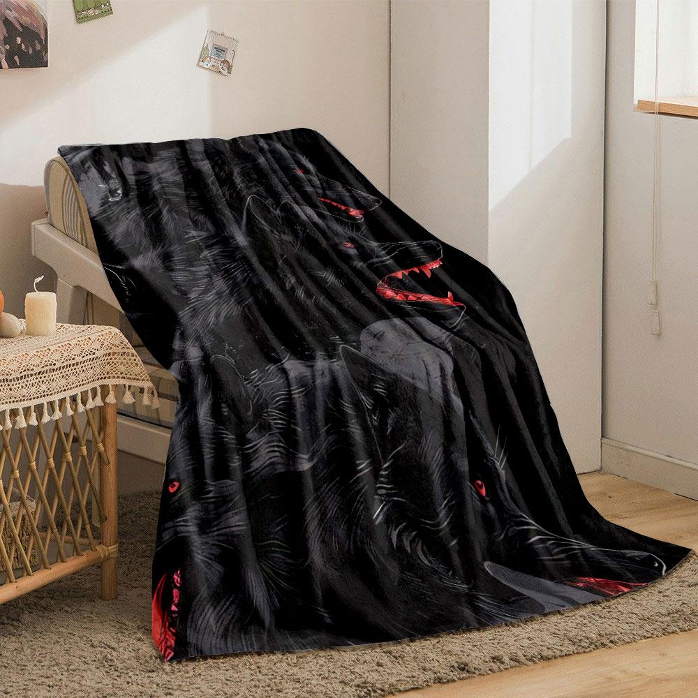 The pattern features dark wolves with red eyes and red snarling mouths on black. for all seasons blanket lunch break throw gift