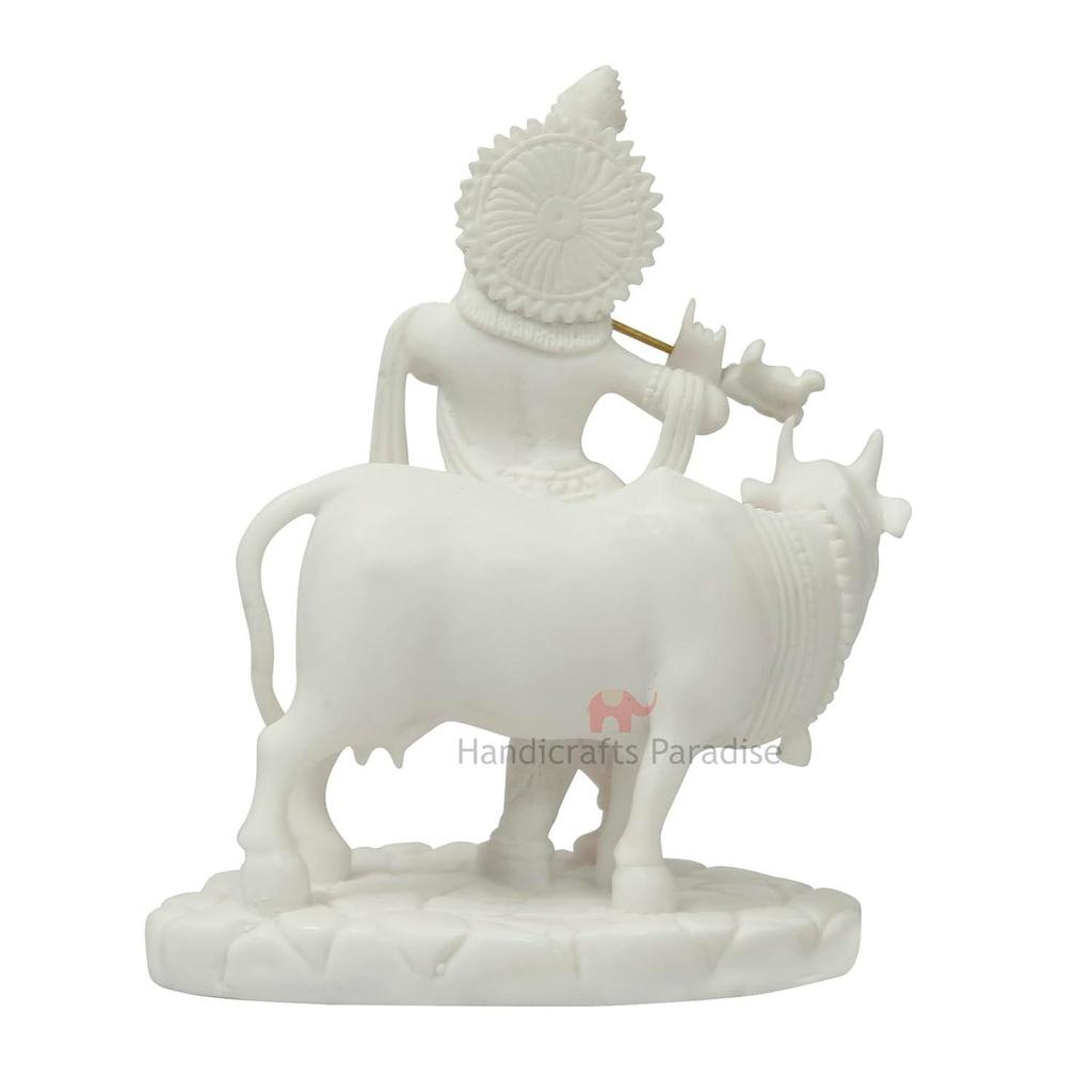 Вырезанный из смолы Кришна с коровой