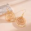Europe and America Metal Spiral Hook Earrings for Women Personality Circular Hollow Earrings Gothic Party Jewelry Gifts
