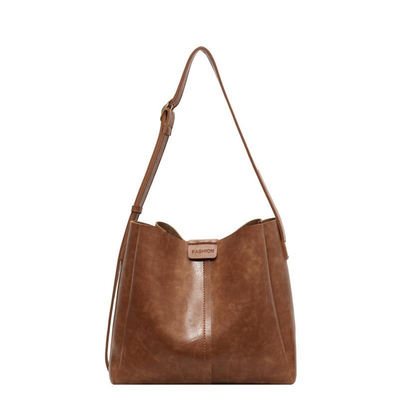 Универсальная женская кожаная сумка из искусственной кожи большой емкости для поездок на работу, новая корейская модная сумка в стиле ретро, ​​однотонная сумка на плечо