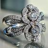 Cao Shi European & American Retro Floral Diamond Ring - Women's Symmetrical Cross Finger Design