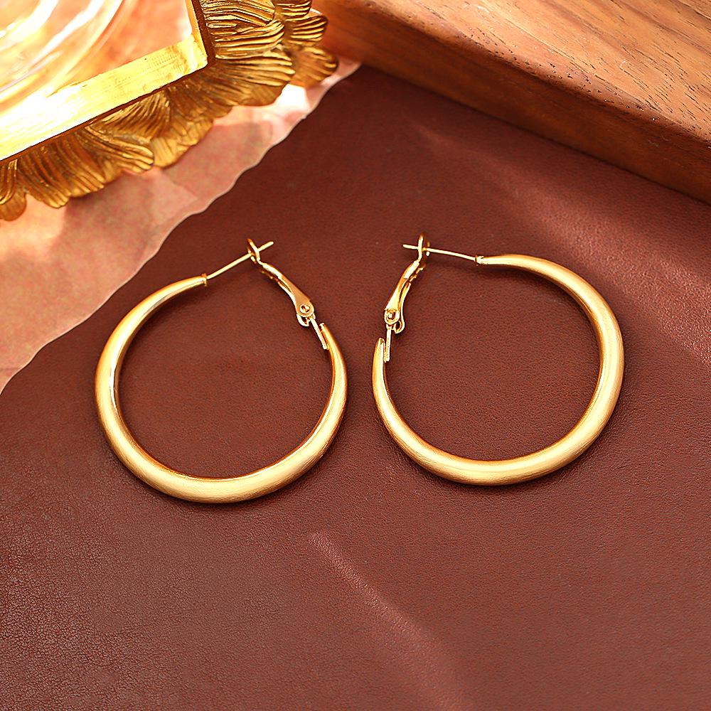 Trendy European & American Matte Gold Earrings: Sleek, Fashionable, High-End Style with a Modern Edge