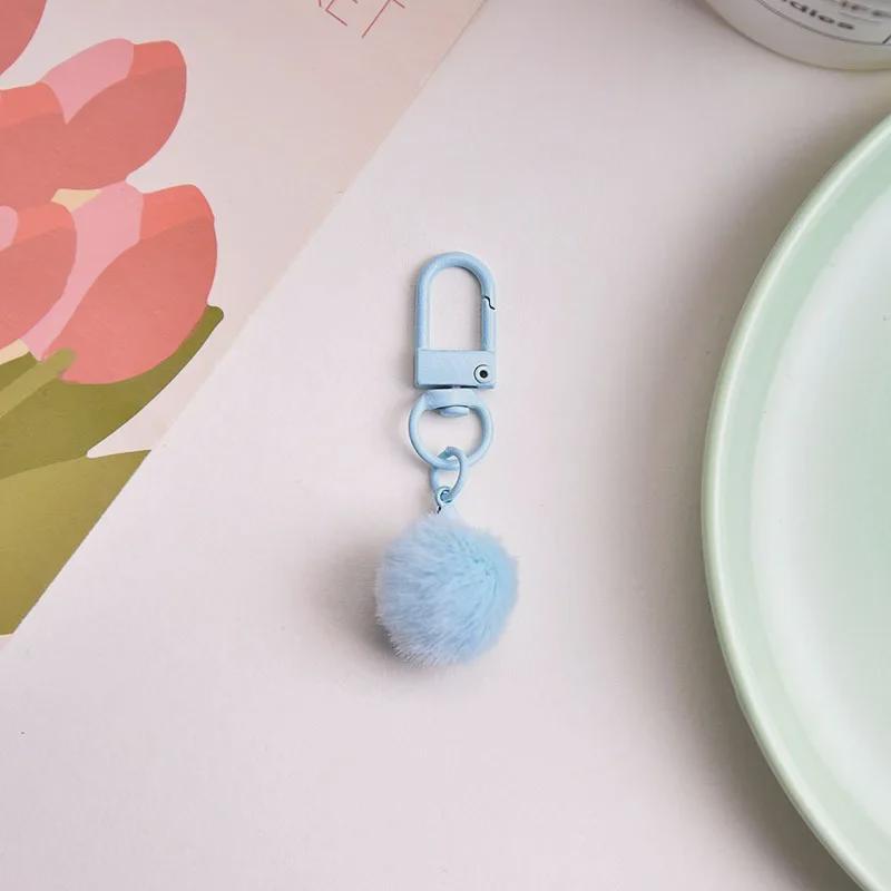 Брелок для ключей в виде разноцветного плюшевого шарика с молочным кулоном, абажуром в виде макарон и вращающейся пряжкой.