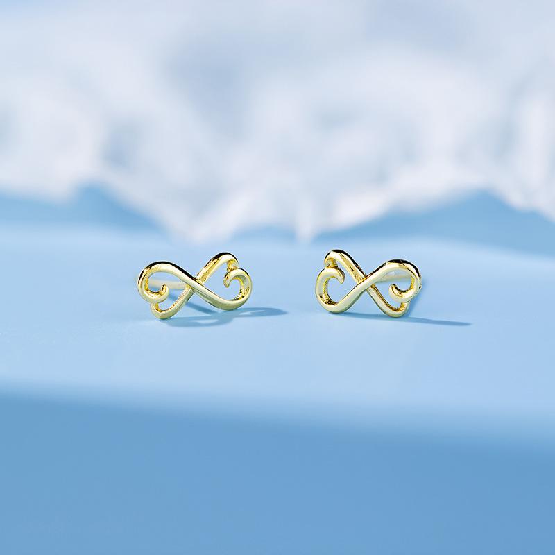 Маленькие серьги-гвоздики в форме банта для пригородных поездок. Женские серьги. Простые и универсальные серьги в восточном стиле.