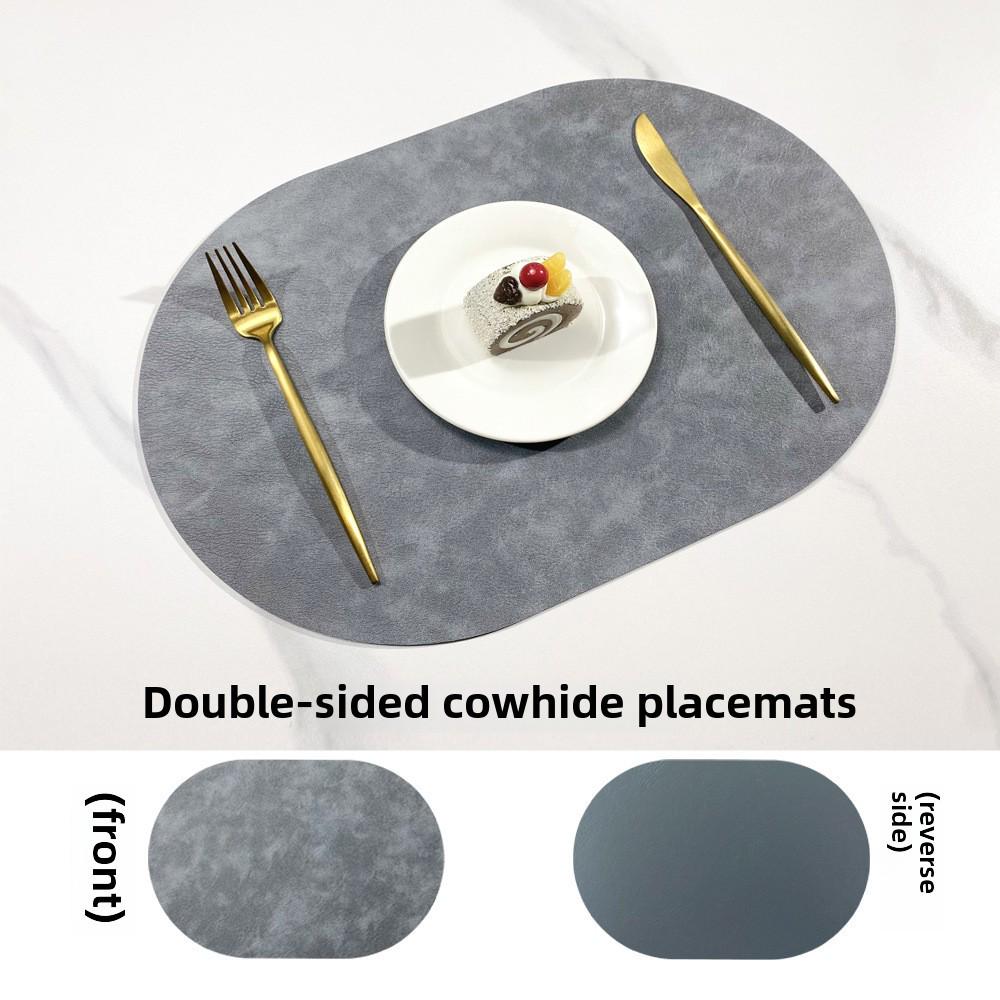 Двусторонний коврик под приборы из коровьей кожи в скандинавском стиле - водонепроницаемый и маслостойкий овальный изоляционный коврик