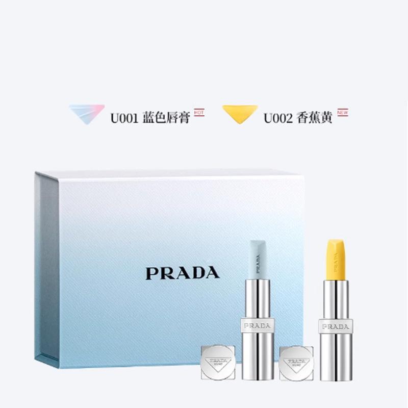 Prada Набор косметики 2026 Новый год Ограниченная серия Знаменитость Двухцветная помада Подарочная коробка Набор из двух предметов: #U002 банановая помада 3,8 г + #U001 синяя помада 3,8 г