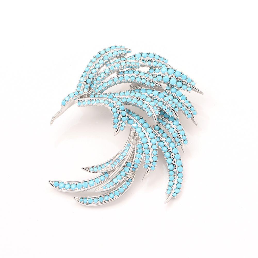New high-end blue zircon inlaid stone phoenix feather brooch niche light luxury anti-light pin accessories women's models