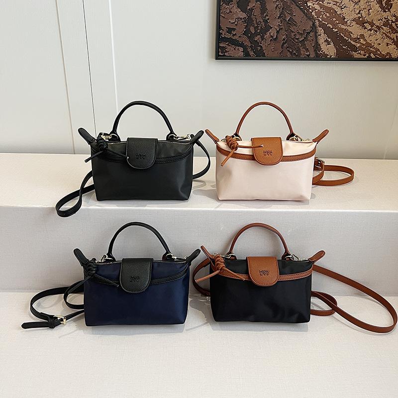 Весна 2025 новая портативная повседневная универсальная сумка через плечо мессенджер Longxiang изменение однотонного цвета уличная сумка