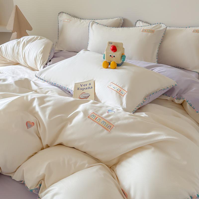 Luxurious Xinjiang Long-Staple Cotton Embroidered Four-Piece Bedding Set - Skin-Friendly, Shell-Edged, for All Seasons.