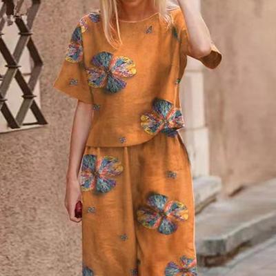 2 шт./компл. Женская футболка Брюки Костюм с круглым вырезом с коротким рукавом и принтом Свободный топ с высокой эластичной талией Широкие брюки Девятые брюки Повседневная повседневная одежда Набор из топа и брюк