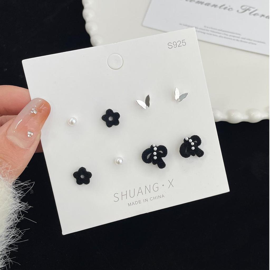 «Изысканные серьги-флок с бантом»: Элегантный и милый дизайн ниши для осени/зимы"