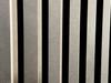 Black panel clock in slats 155x30cm