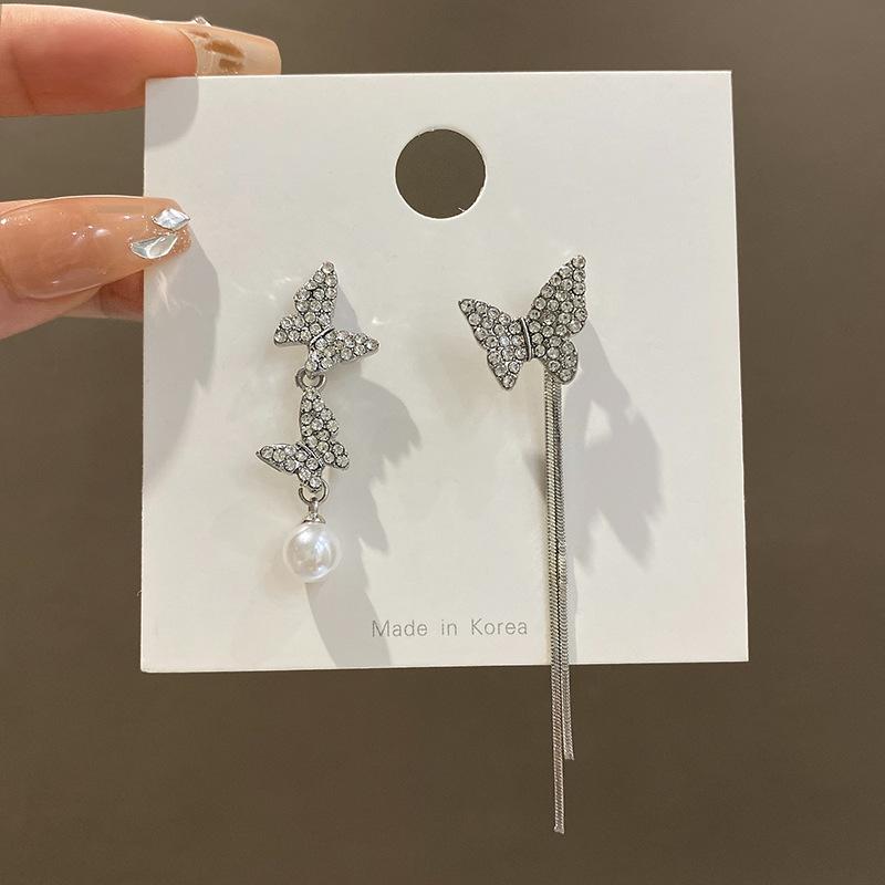 Silver needle asymmetrical butterfly pearl fringed earrings women's high sense long super fairy Internet celebrity stud earrings ear jewelry