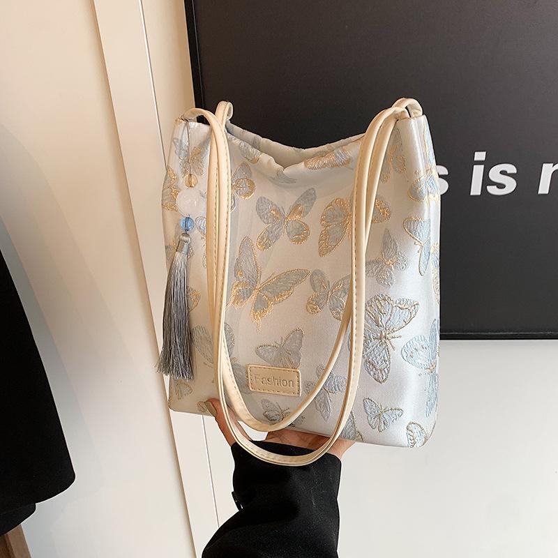 Новый китайский стиль, иностранный стиль, большая вместимость, сумка под мышкой, женская новая модная сумка-ведро для поездок на работу и обратно 2024 года