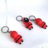 Брелок для ключей «Игра в кальмара» Красный брелок для косплея «Игры в кальмара» Телевизионные тематические солдаты в маске Милые мультяшные силиконовые брелоки-цепочки GZW