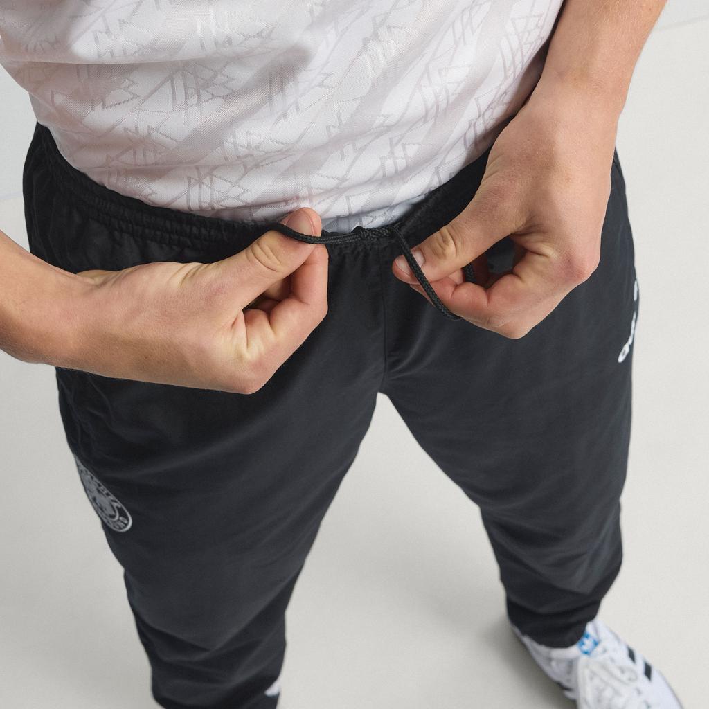 adidas Мужские вязаные спортивные штаны черные с умеренной манжетой
