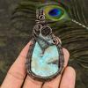 Подарочный кулон в обертке из медной проволоки с натуральным карибским драгоценным камнем Ларимар 3,35 z0l07
