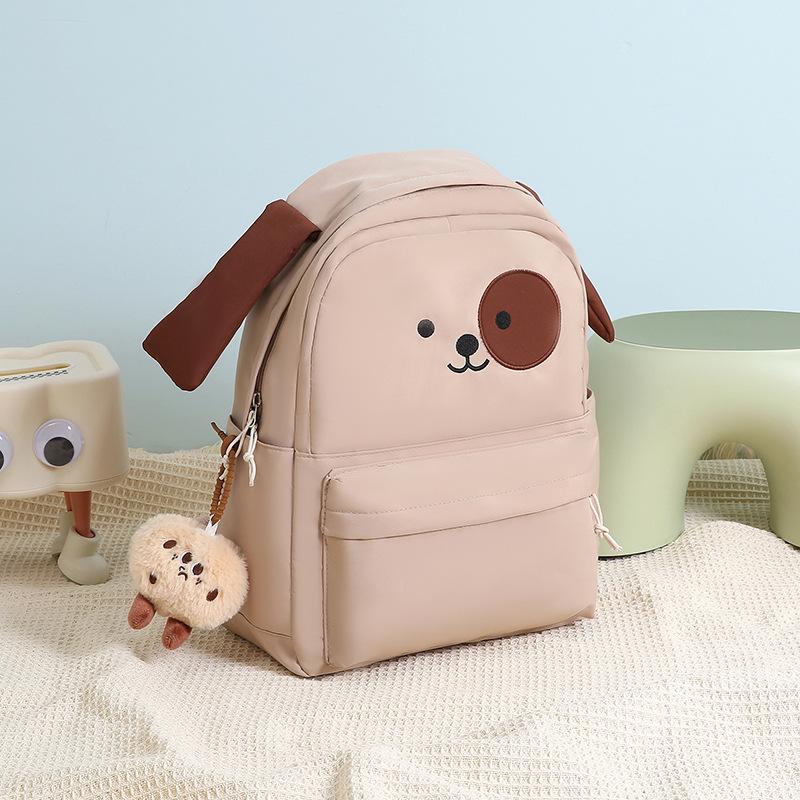 Lightweight puppy schoolbag female cute junior high school student primary school student third to sixth grade large capacity backpack simple backpack