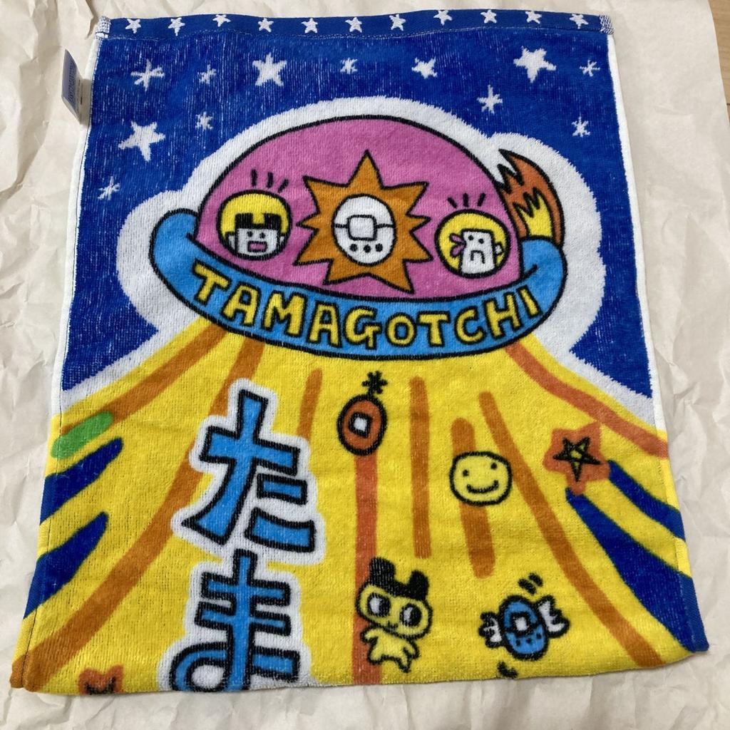 Tamagotchi face 80cm towel, length 34cm, width